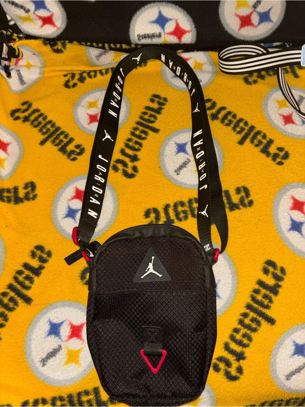 Jordan Black Crossbody Bag with red and white Accents